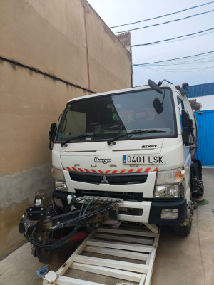 Tall slender porcelain bottle with natural clay textured body and cork stopper.